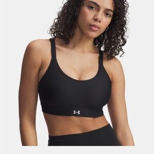 UA Continuum Twist Mid: Under Armour Women's Black Sports Bra